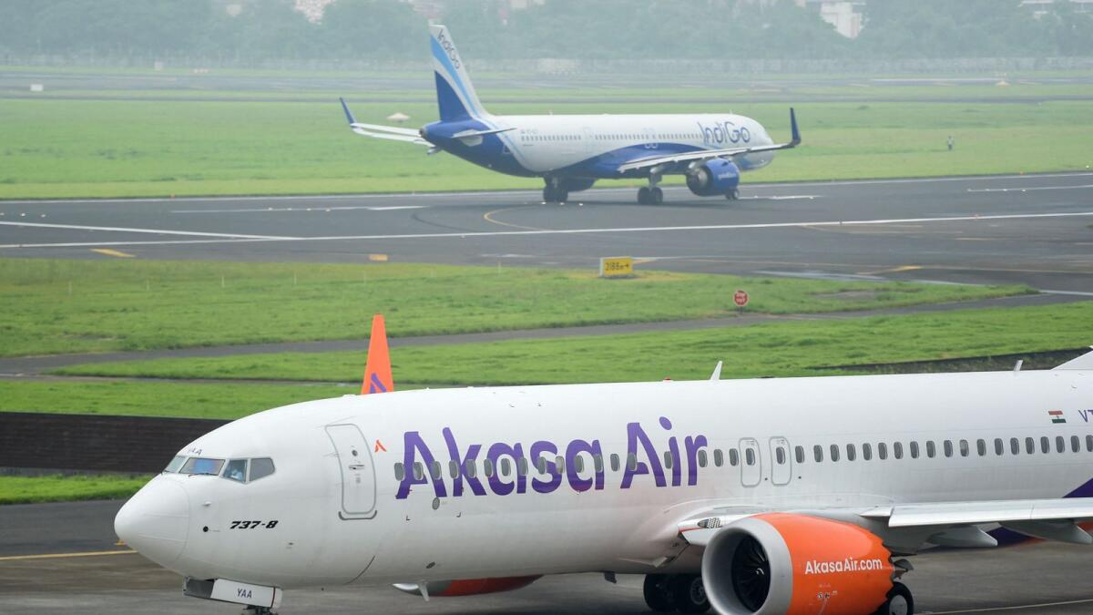 India's newest airline Akasa Air aircraft prepares for take-off from the Chhatrapati Shivaji Maharaj International Airport in Mumbai on August 7, 2022. Akasa Air is making its maiden flight on August 7, backed by billionaire stock investor Rakesh Jhunjhunwala, who's betting on the fast-growing aviation market even as fuel prices soar. — AFP