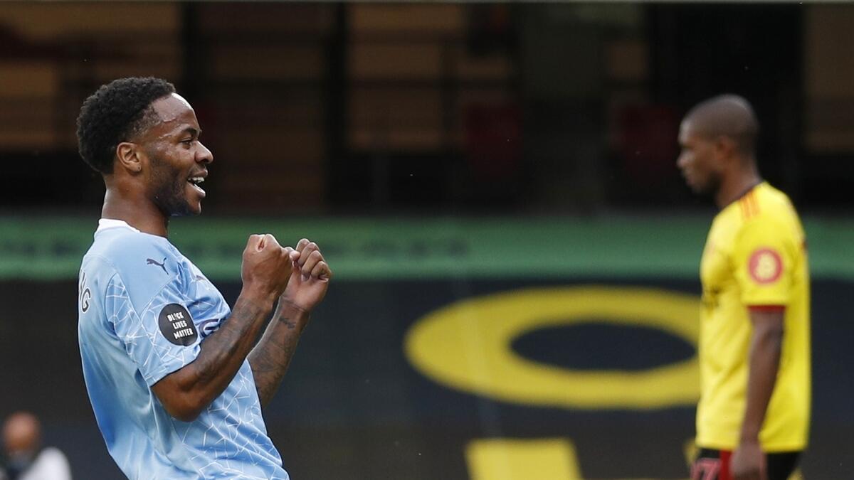 Manchester City's Raheem Sterling celebrates scoring their first goal. (Reuters)
