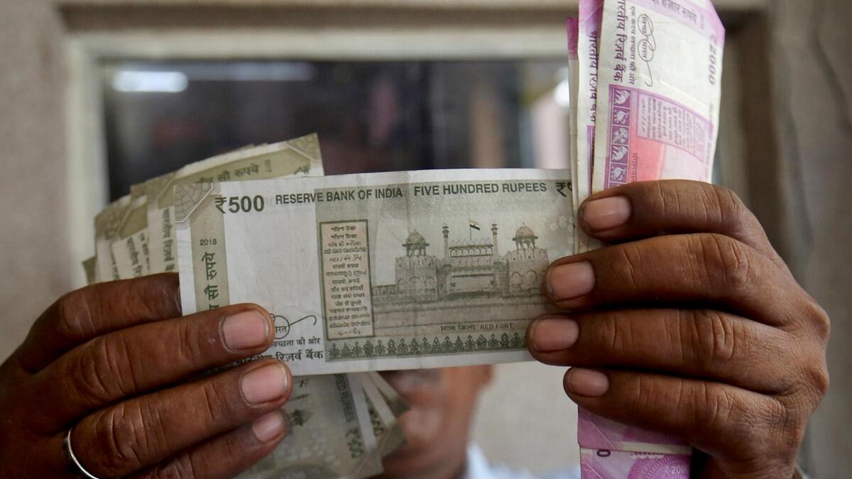 Indian rupee, dollar,  UAE dirham 