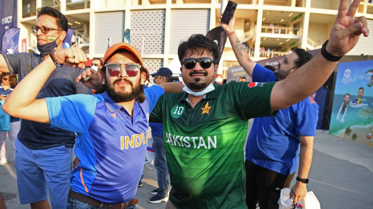 Fans cheer outside the Dubai International Cricket Stadium before the start of the ICC T20 World Cup match between India and Pakistan in Dubai on October 24, 2021. (AFP file)