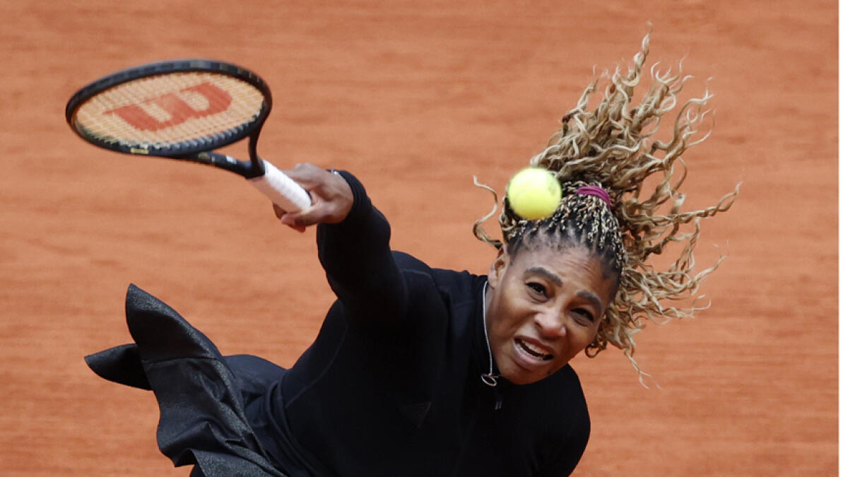 Serena Williams in action during her first round match against Kristie Ahn. - Reuters