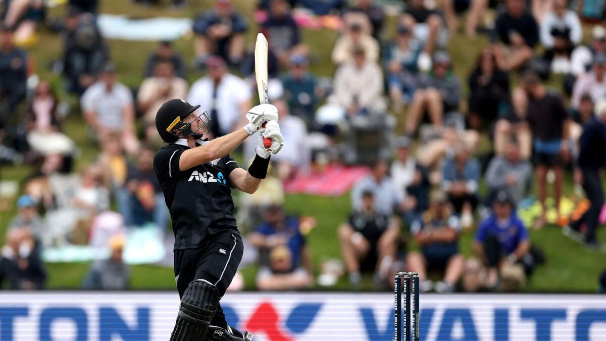 New Zealand's Martin Guptill hits the ball out of University Oval during the 1st ODI against Bangladesh. — AFP
