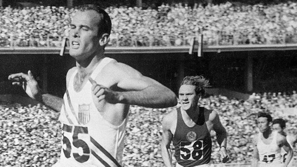 Bobby Joe Morrow (left) was the first since Jesse Owens in 1936 to win gold in these three events. -- Twitter