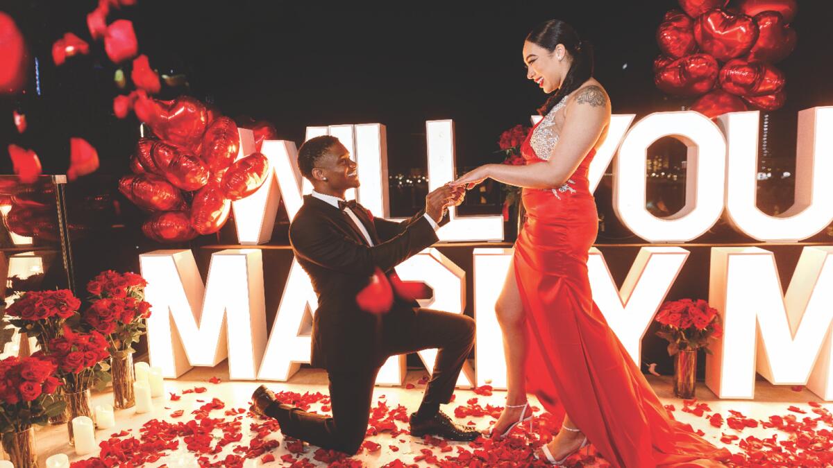YouTube sensation Shaquan Roberts proposes to Rissa G on a private rooftop overlooking Dubai Marina and Ain Dubai