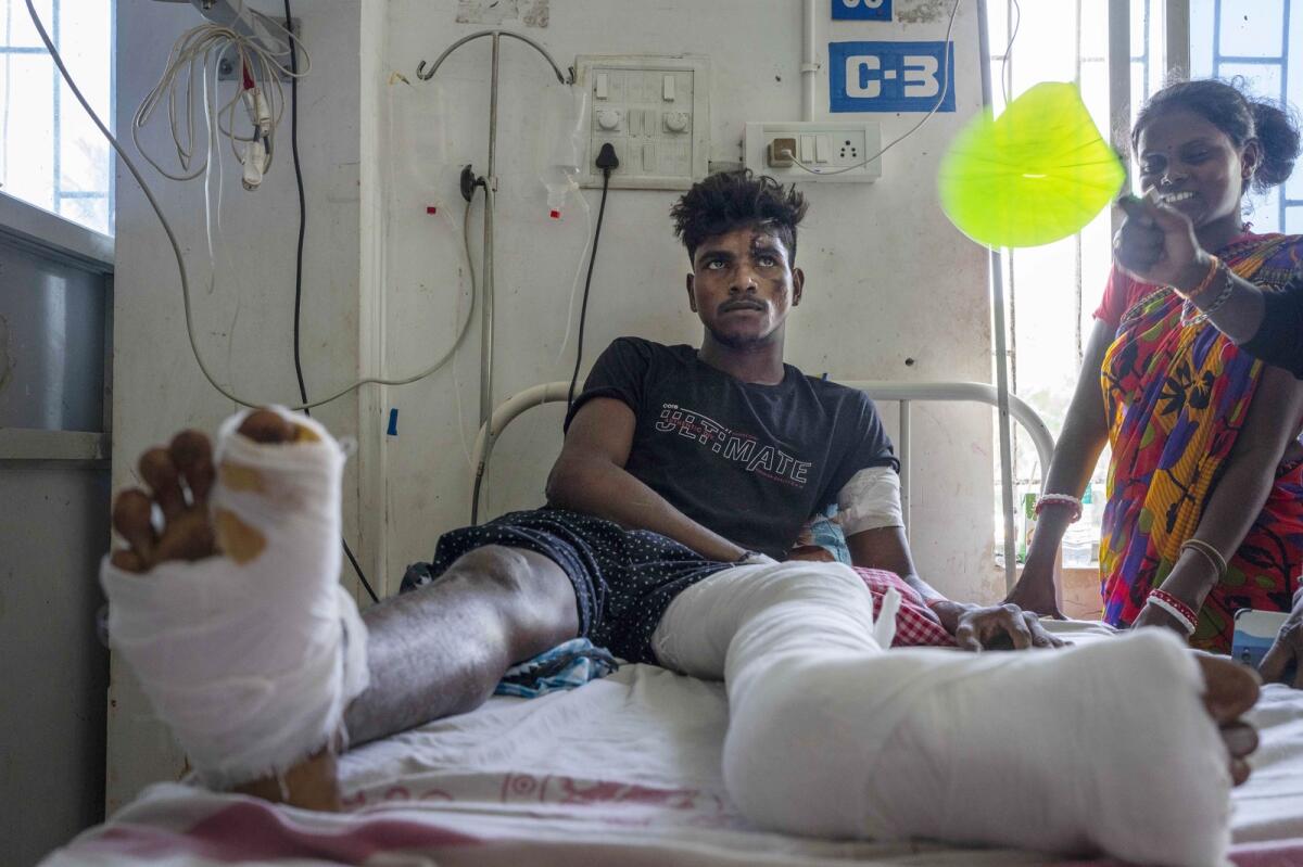 Gura Pallay, who was onboard one of the two passenger trains that crashed on Friday, receives treatment at a hospital in Balasore district in Orissa, India, on June 4, 2023. Photo: AP