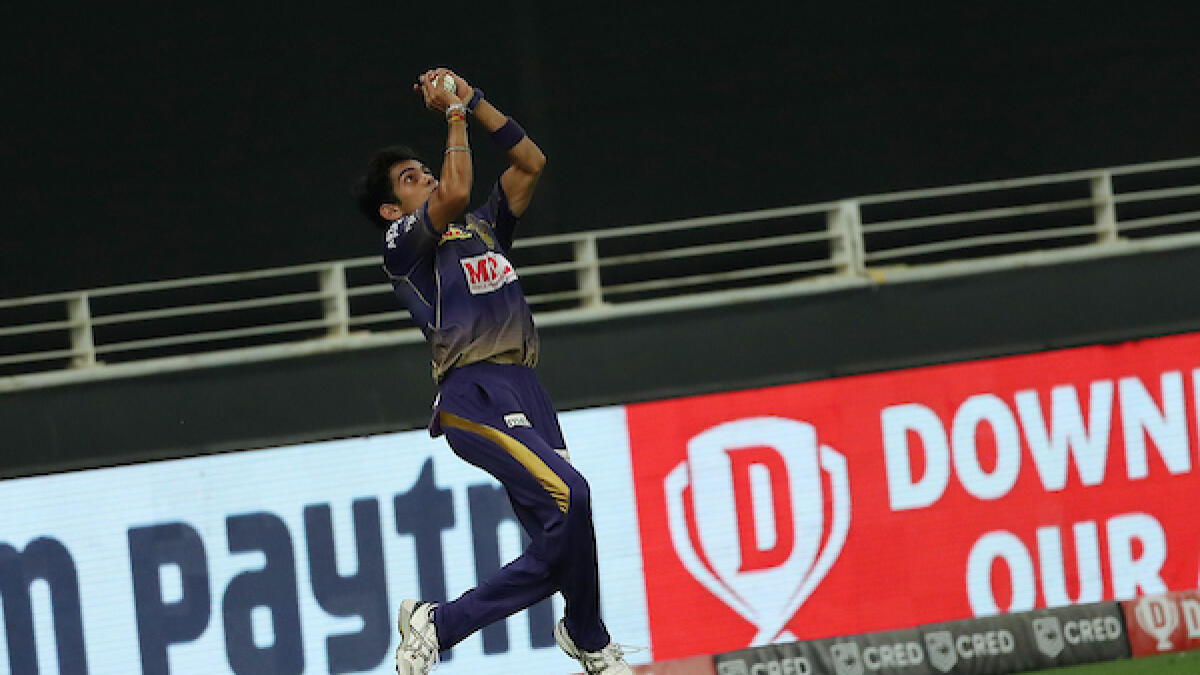 Kamlesh Nagarkoti of Kolkata Knights takes a catch during the match against Rajasthan Royals in Dubai on Wednesday night. - BCCI/IPL