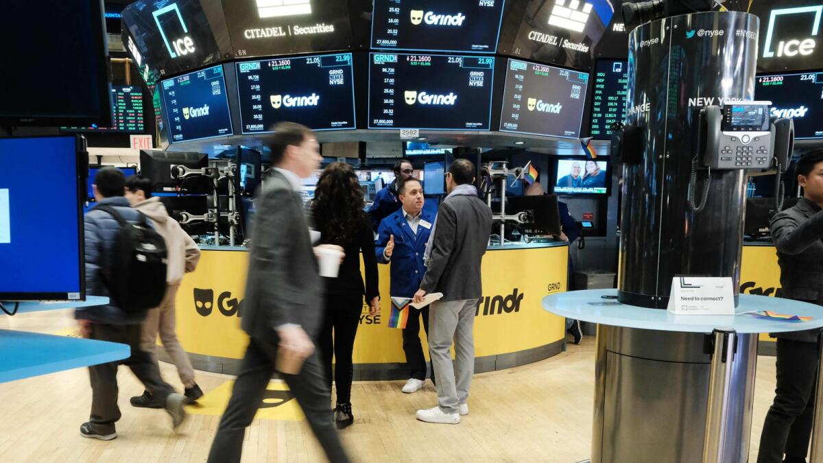 Traders at the New York Stock Exchange. Investors that have whittled down equity positions and beefed up cash reserves have shown a tendency to jump aboard stock rallies in recent months. - AFP file