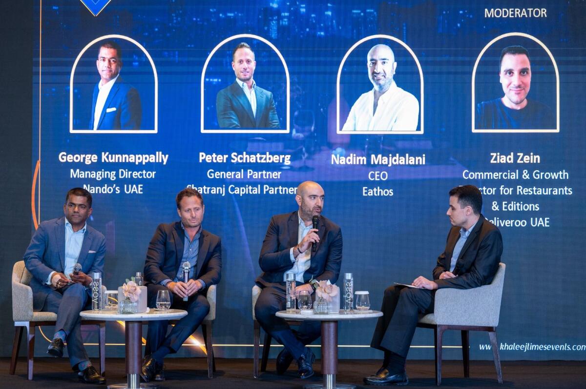 Panel discussion on 'The Dark Kitchen Revolution: Challenges and Opportunities' with moderator Ziad Zein, Commercial &amp; Growth Director for Restaurants &amp; Editions, Deliveroo UAE (right) and guest panellists Nadim Majdalani, CEO, Eathos, Peter Schatzberg, General Partner, Shatranj Capital Partners, and George Kunnappally, Managing Director, Nando’s UAE