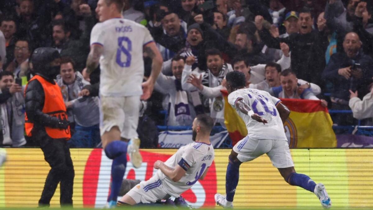 Karim Benzema (centre) celebrates his goal against Chelsea. (Real Madrid Twitter)