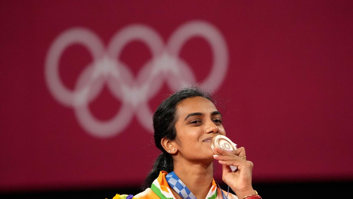 PV Sindhu smiles during the medal ceremony at the 2020 Summer Olympics in Tokyo. (AP)