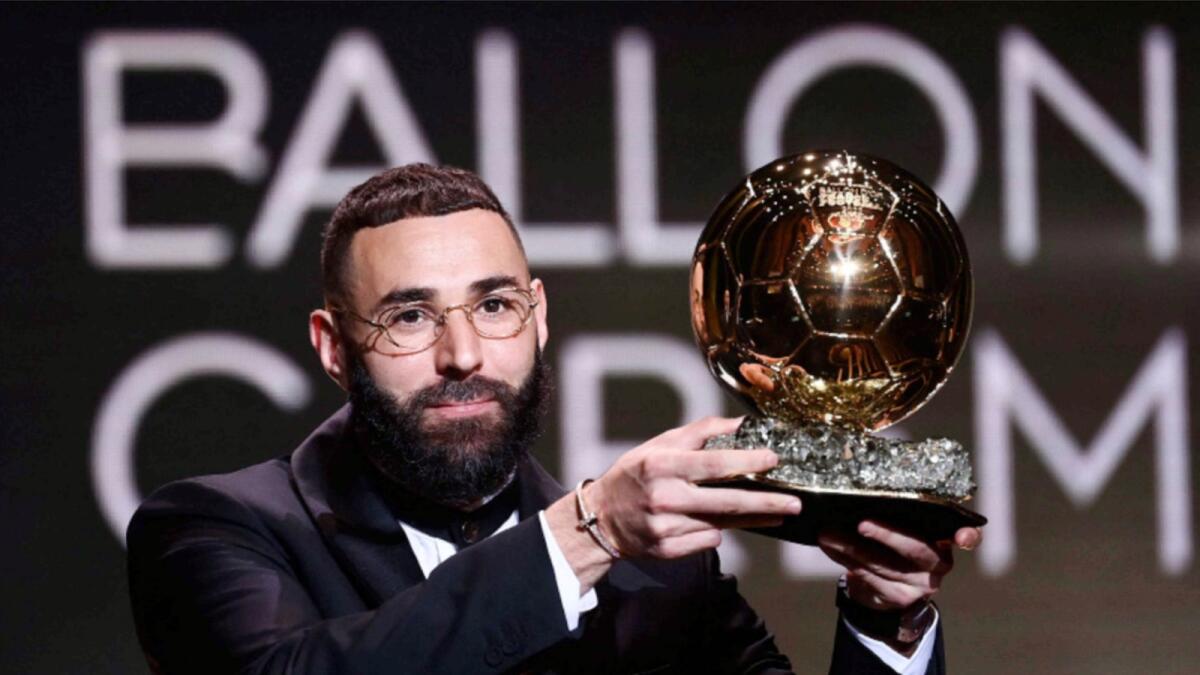 Karim Benzema receives the Ballon d'Or award during the 2022 Ballon d'Or France Football award ceremony at the Theatre du Chatelet in Paris. — AFP