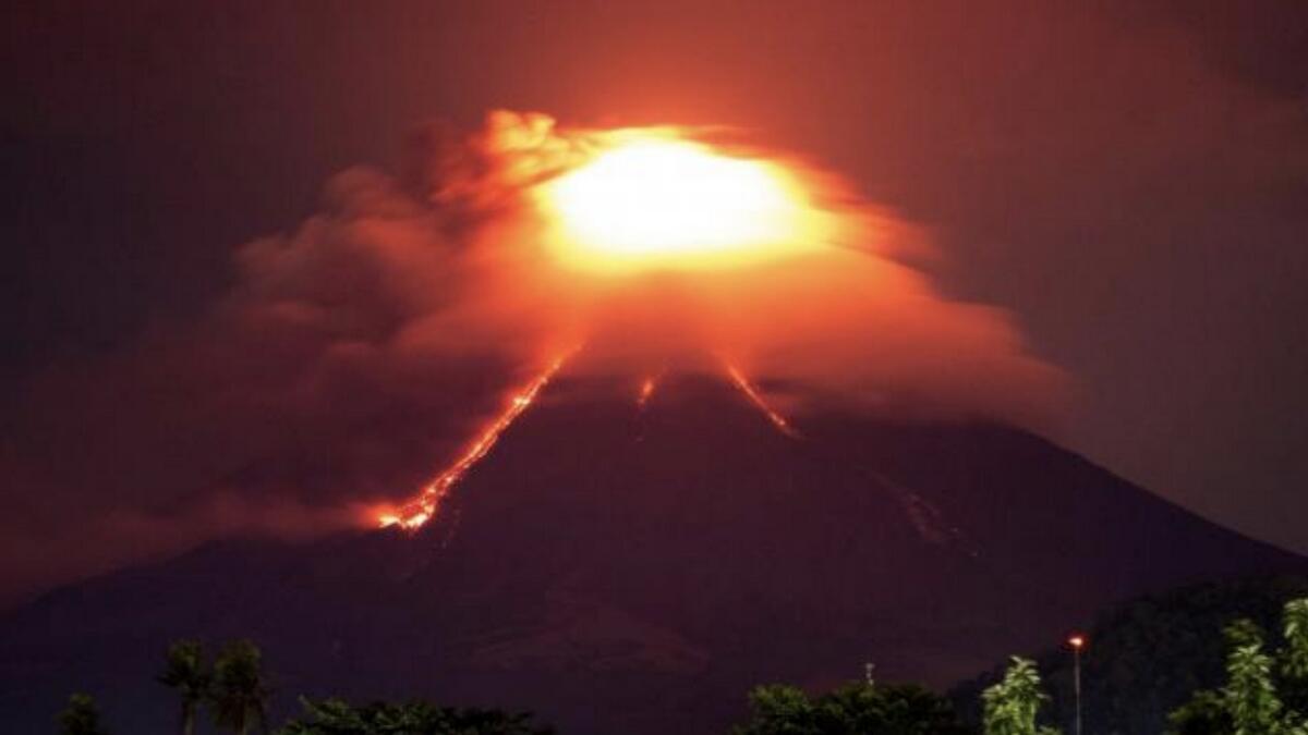 Philippine volcano rains ash, violent eruption feared