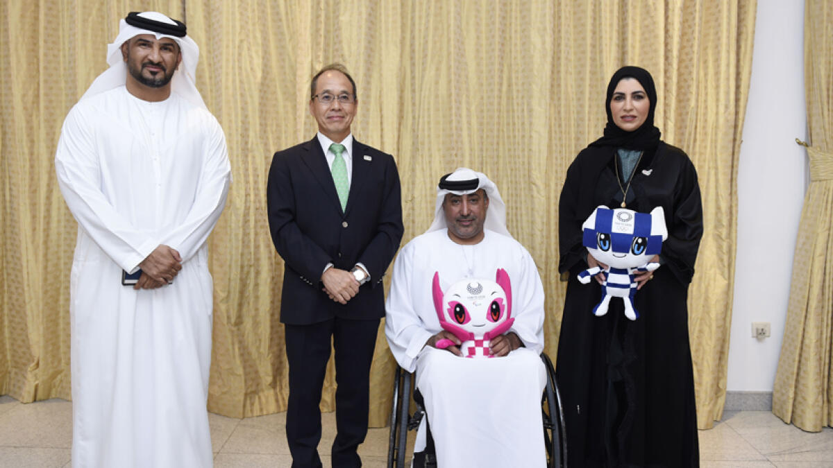 National Olympic Committee officials hold the Tokyo Olympics and Paralympics mascots. - Supplied photo