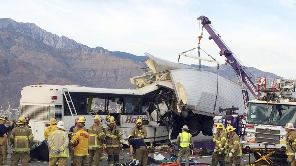 13 killed as US bus slams into truck on slowed-down highway