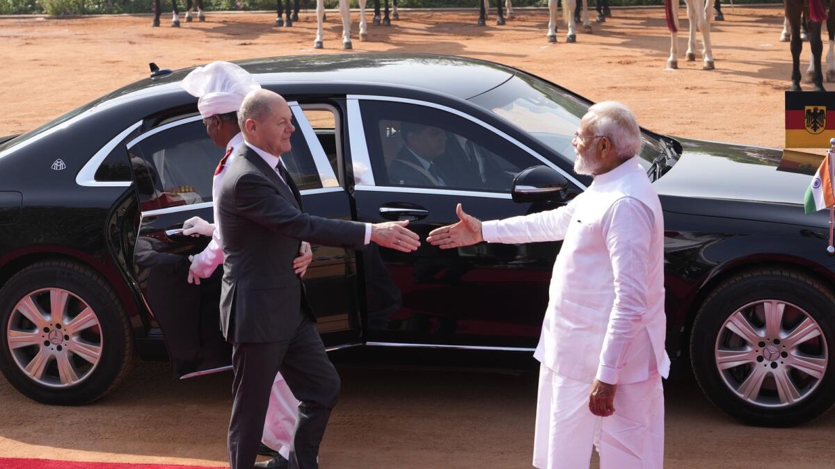 Indian Prime Minister Narendra Modi, right, welcomes German Chancellor Olaf Scholz in New Delhi on February 25, 2023 — AP