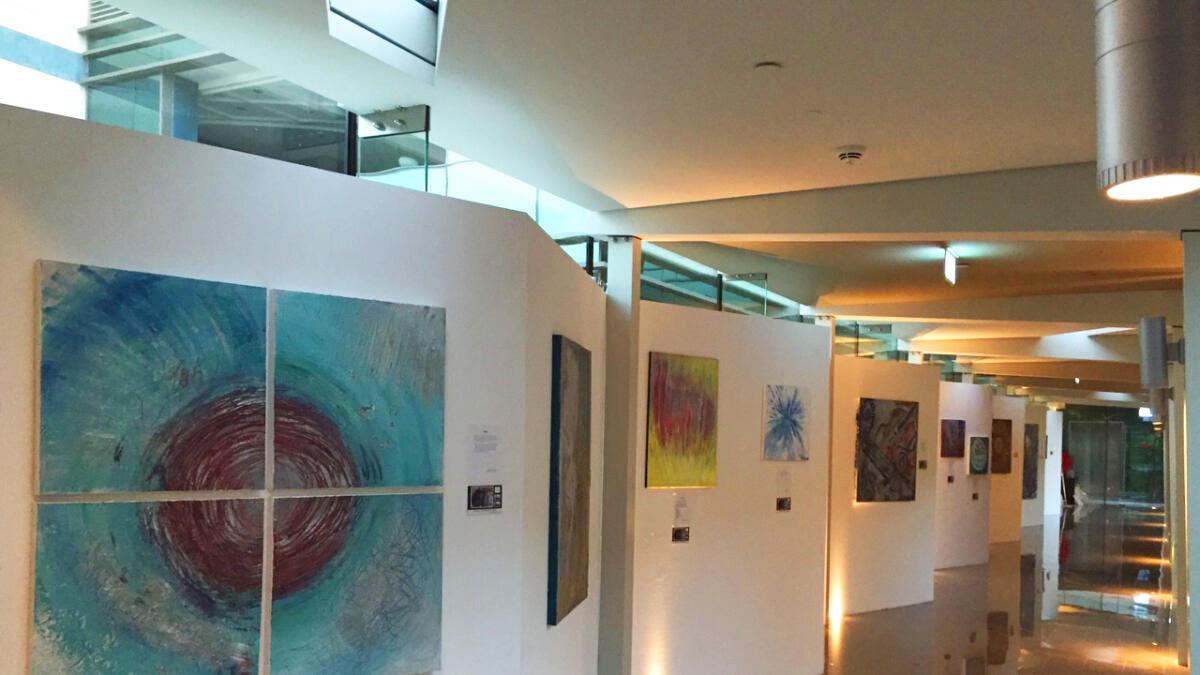 A display of her artwork at the Glass Corridor of Jumeirah Creekside Hotel.