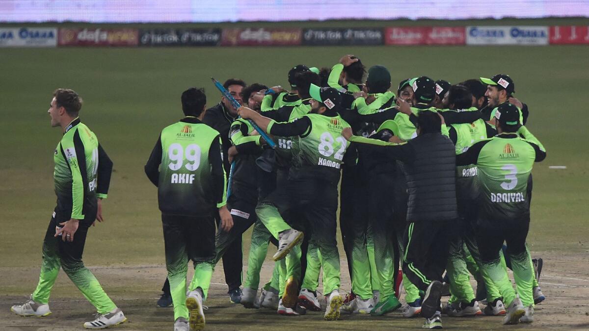 Lahore Qalandars players celebrate the victory in the final against Multan Sultans in Lahore on Sunday. (AFP)