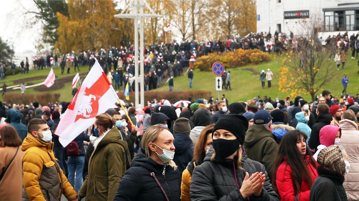 Opposition supporters gather during a rally called 'The March of Democracy' to protest against the Belarus presidential election results in Minsk on Sunday.