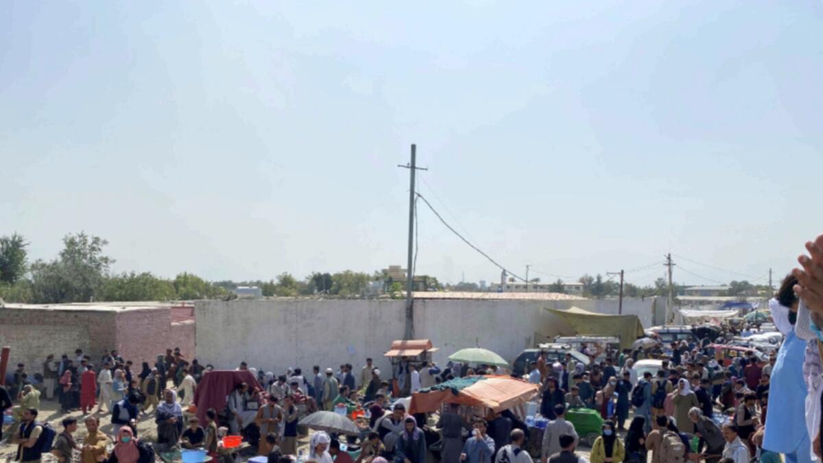 Crowds of people near the airport in Kabul. — Reuters