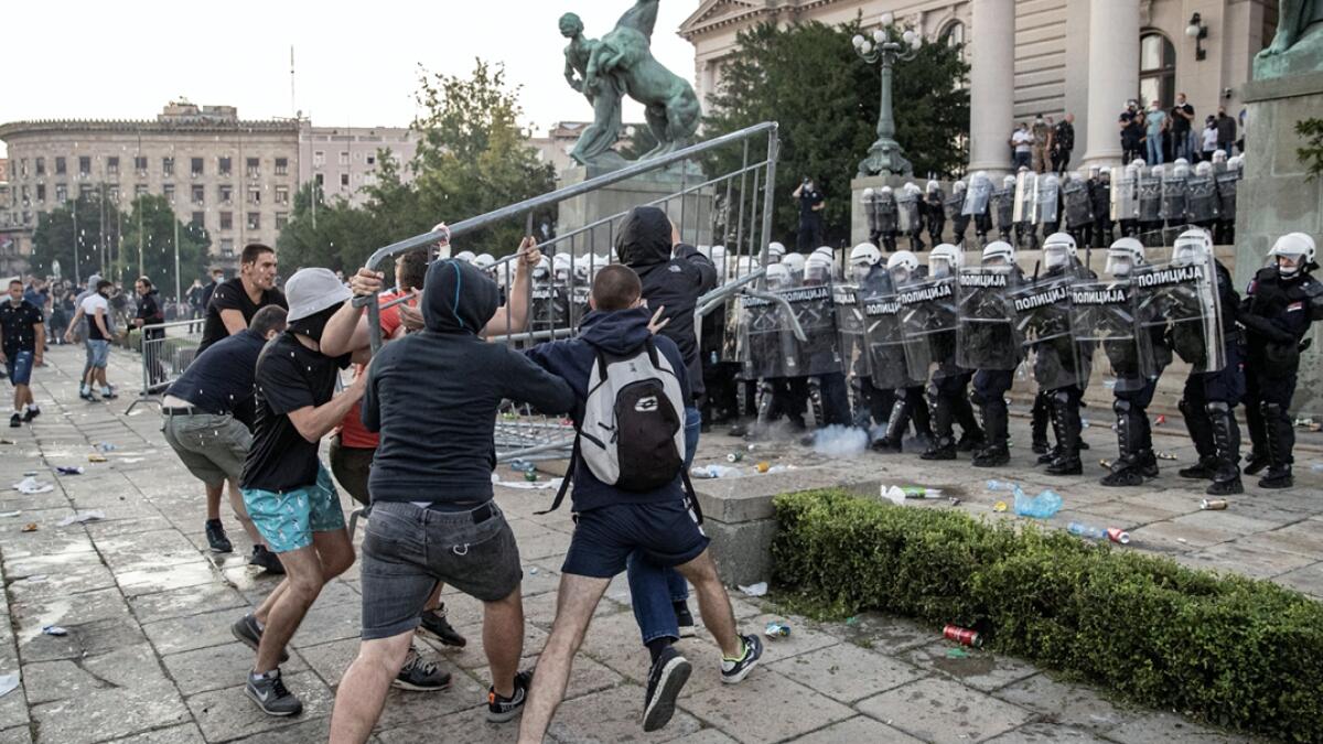 Demonstrators clash with police officers during an anti-government rally, amid the spread of the coronavirus disease (COVID-19), in front of the parliament building in Belgrade, Serbia. Photo: Reuters&lt;p&gt;&lt;/p&gt;&lt;p&gt;&lt;/p&gt;(Research: Mohammad Thanweeruddin)