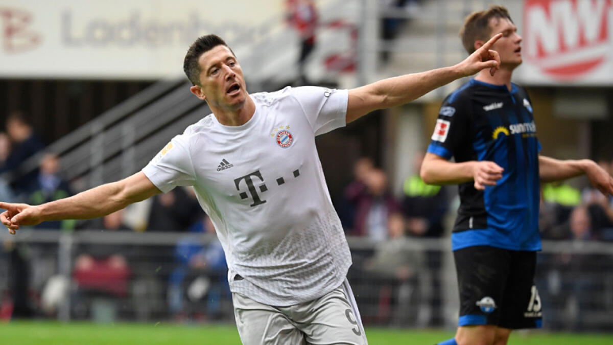 Bayern go a point clear at top; Leipzig stunned by visitors Schalke 3-1