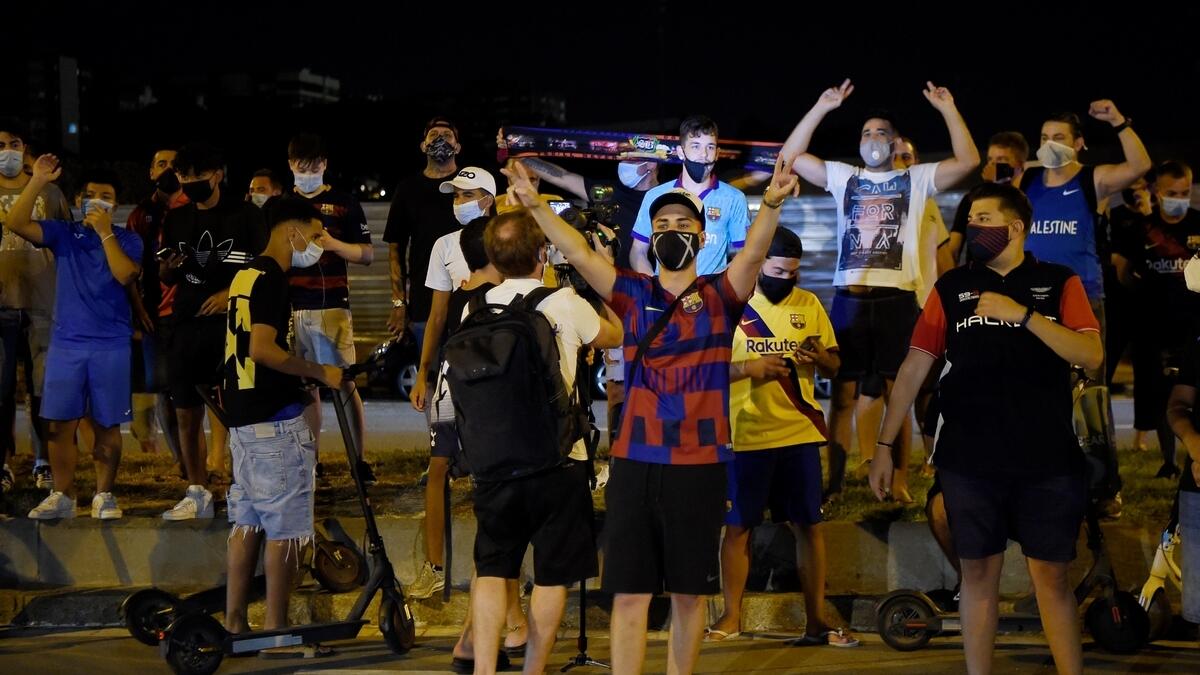 Barcelona fans protest against the club president outside the Camp Nou after captain Lionel Messi told Barcelona he wishes to leave the club immediately. (Reuters)