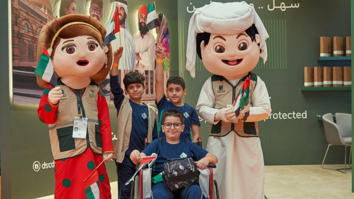 Children at the DSCD stall at Sharjah International Book Fair. — Supplied photo