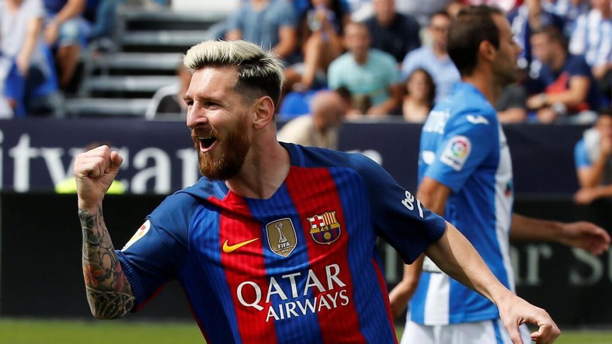 Messi double leads Barca past Leganes