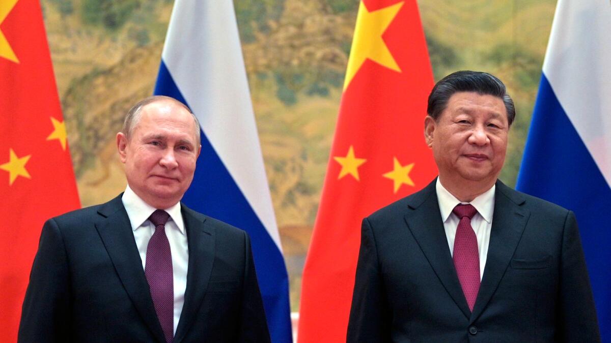 Chinese President Xi Jinping and Russian President Vladimir Putin pose for a photo prior to their talks in Beijing, China, on February 4, 2022. — AP file
