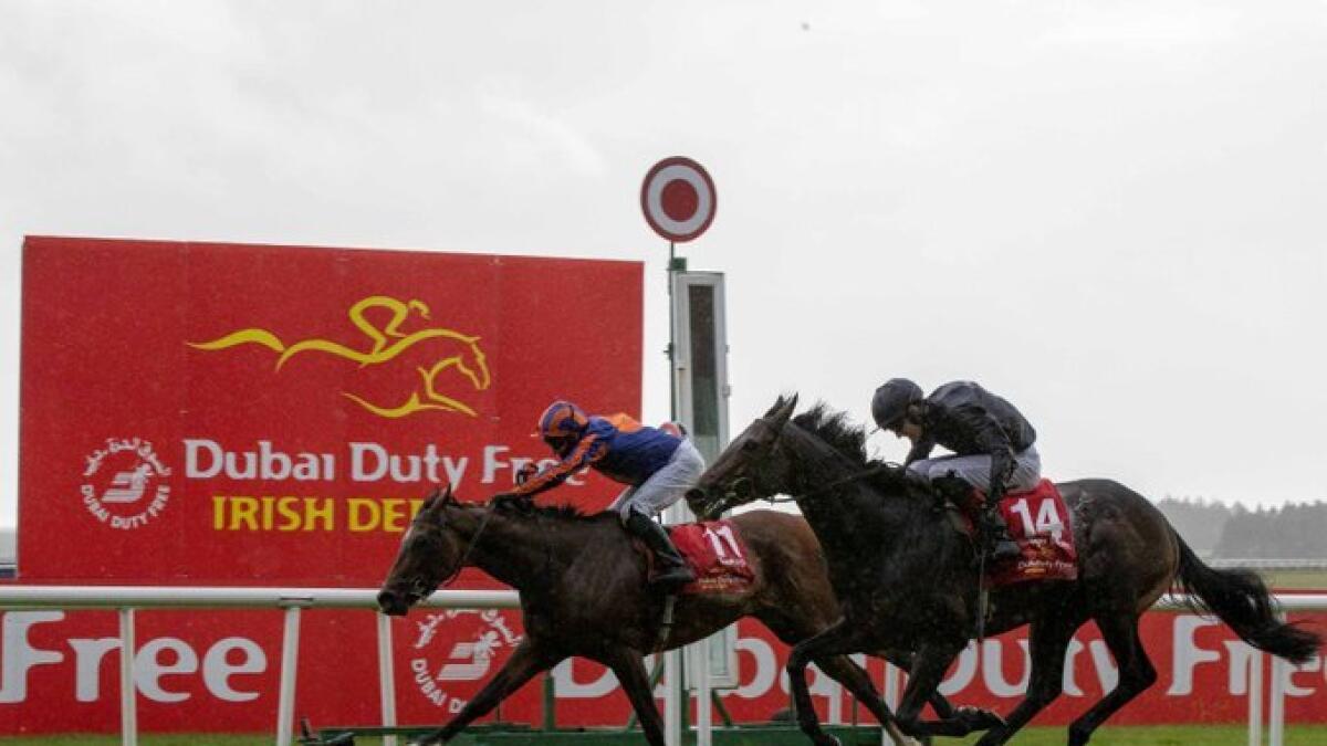 Favourite Santiago holds off stablemate Tiger Moth to clinch the Irish Derby on Saturday. - Twitter