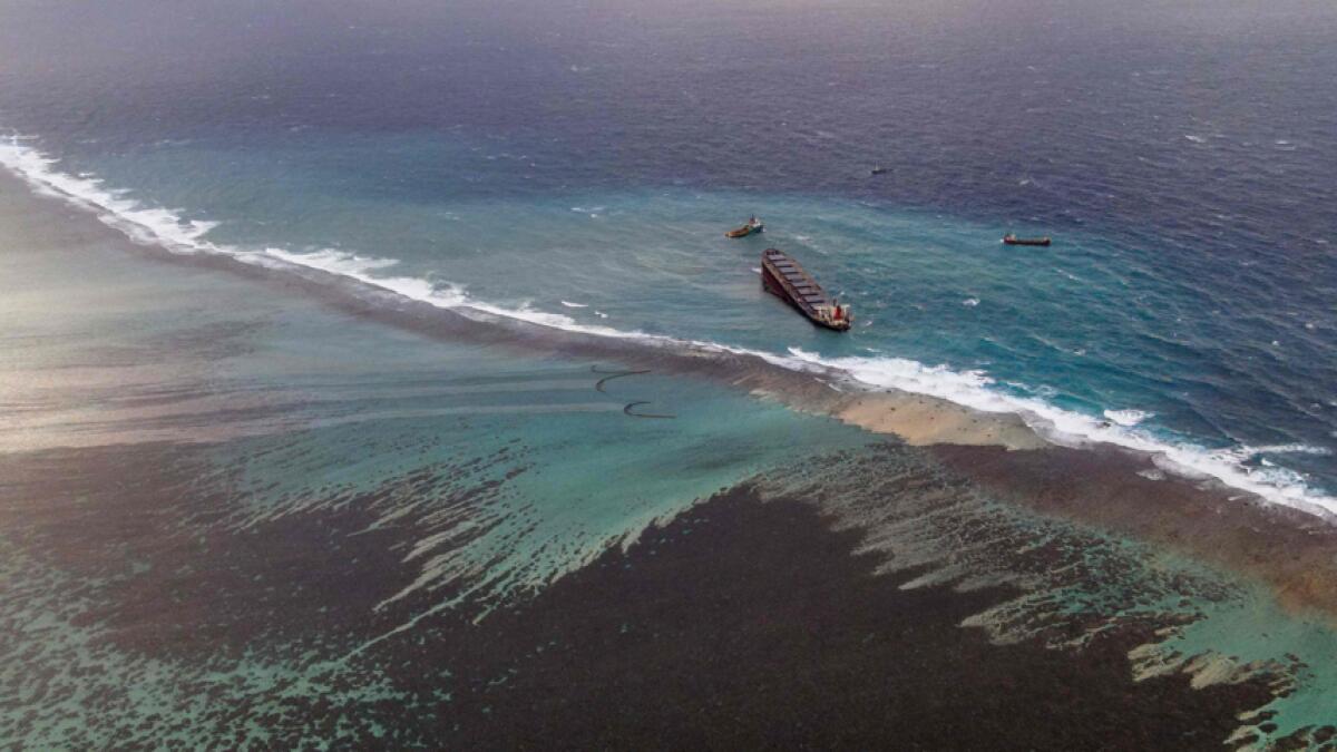 An aerial view shows the site of containment operations for the leaked oil coming from the vessel MV Wakashio, belonging to a Japanese company but Panamanian-flagged, that ran aground near Blue Bay Marine Park off the coast of south-east Mauritius. Photo: AFP&lt;/br&gt;&lt;/br&gt;Research: Mohammad Thanweeruddin/Khaleej Times