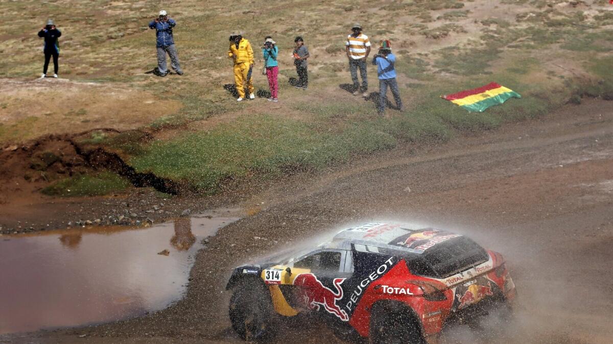 Loeb leads Dakar Rally at midway point