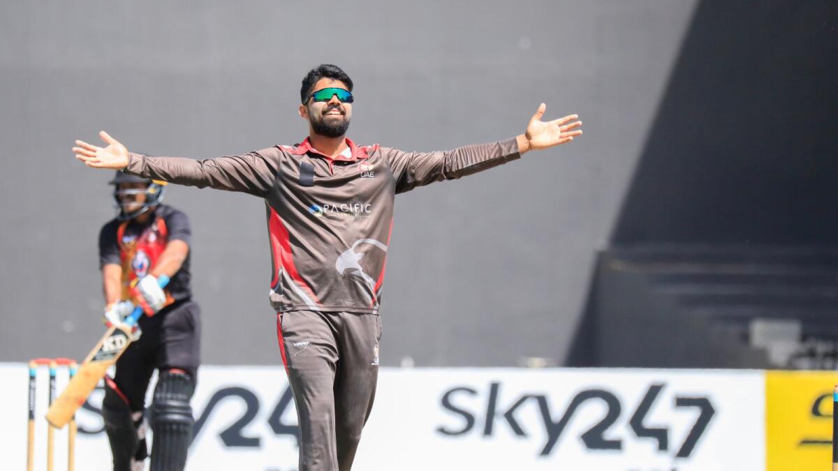 Basil Hameed celebrates a wicket. (UAE Cricket Official Twitter)
