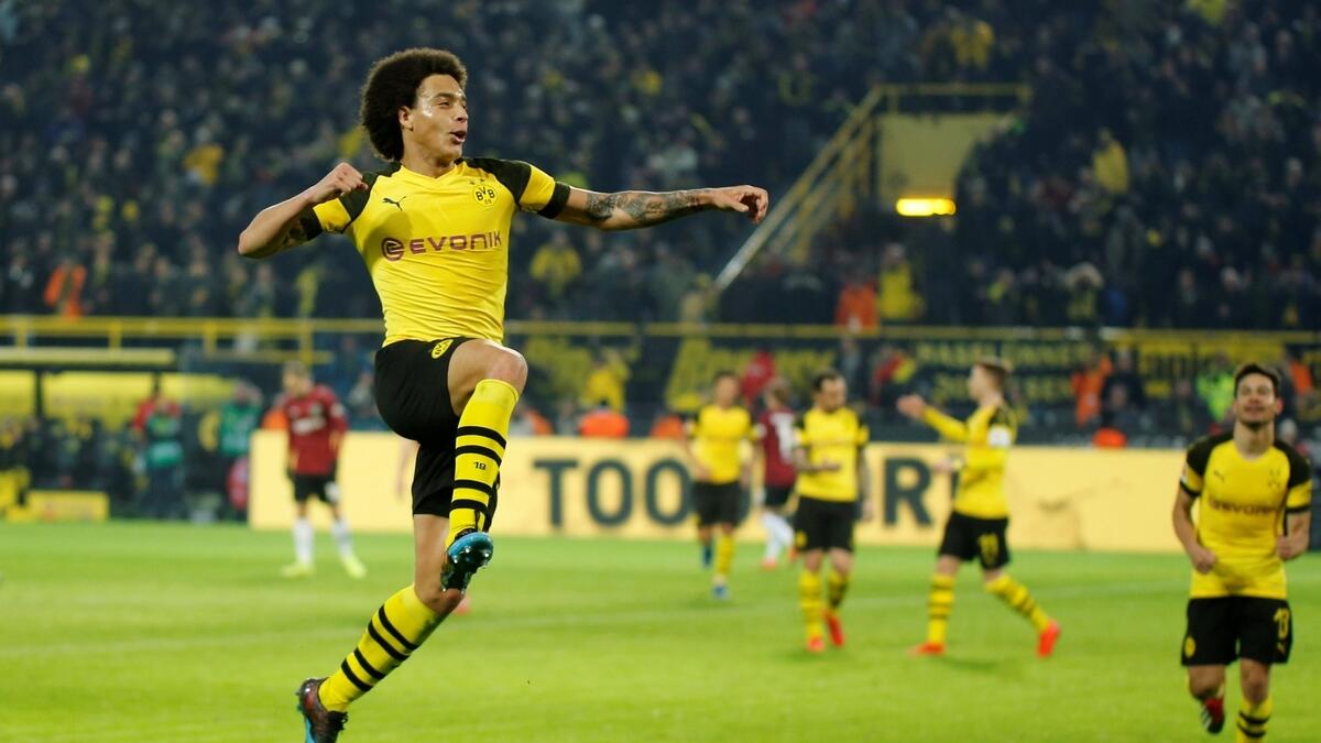 Dortmund go nine points clear of Bayern Munich by thumping Hanover
