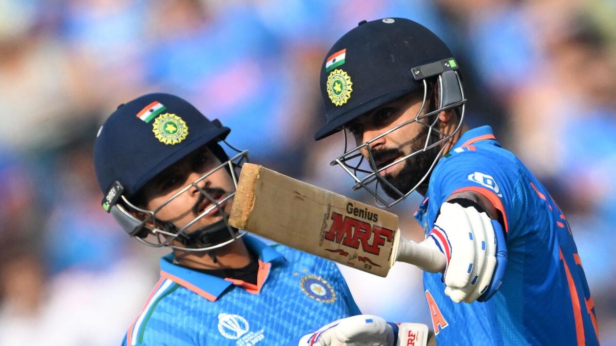 India's Virat Kohli (right) and teammate Shreyas Iyer. — AFP