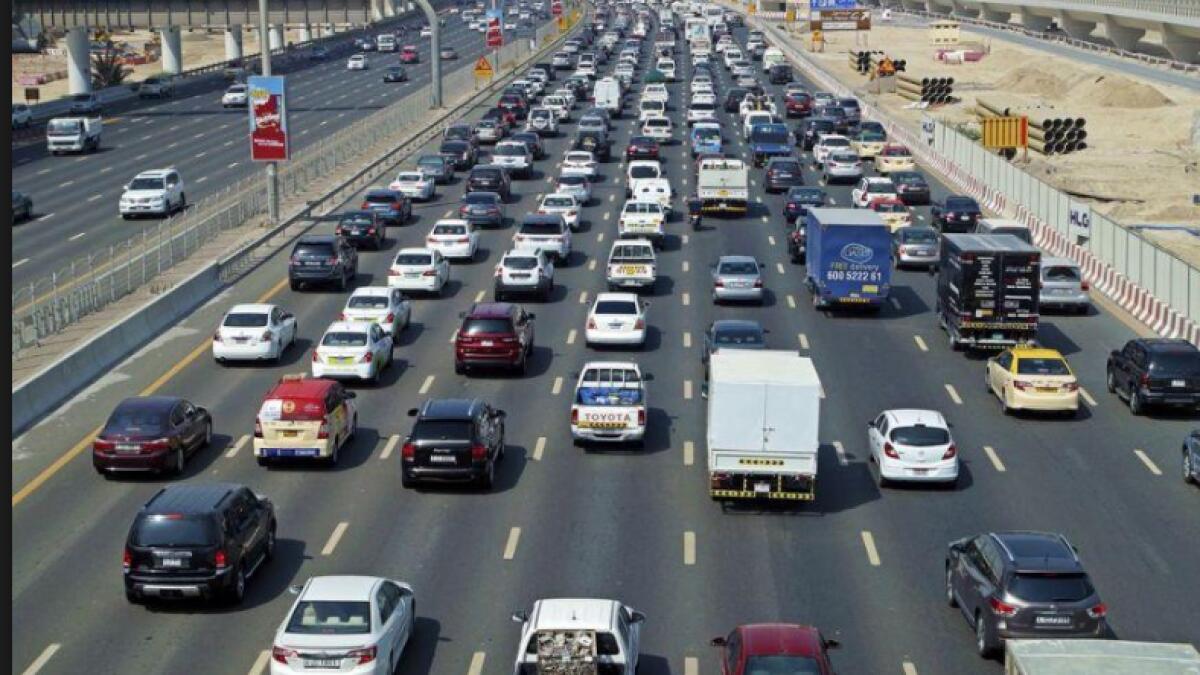What caused traffic congestion, three-hour delay towards Dubai?