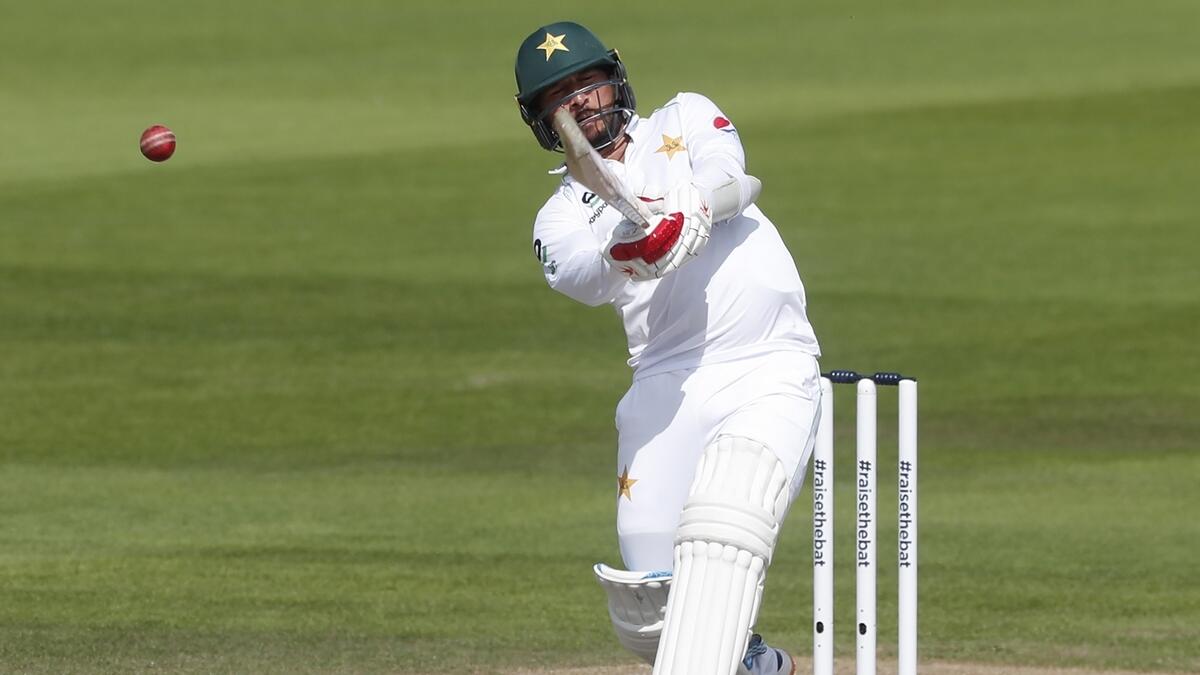Pakistan's Yasir Shah plays a shot during the fourth day of the first cricket Test against England