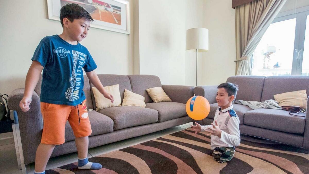 Ali, who aspires to be a footballer, practises the game with his brother Amir. — Photo by Leslie Pableo