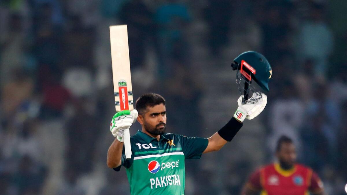 Pakistan's Babar Azam celebrates after scoring a century against West Indies at the Multan Cricket Stadium on Wednesday. — AP