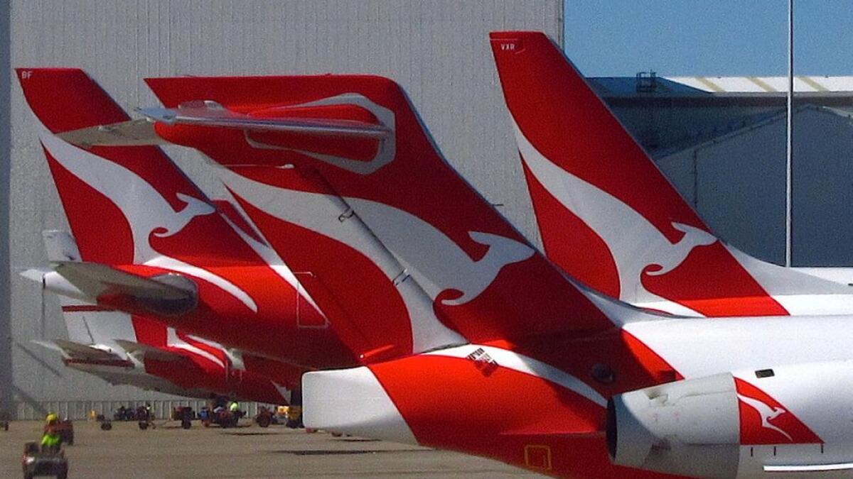 Qantas Airways pays first dividend since 2009