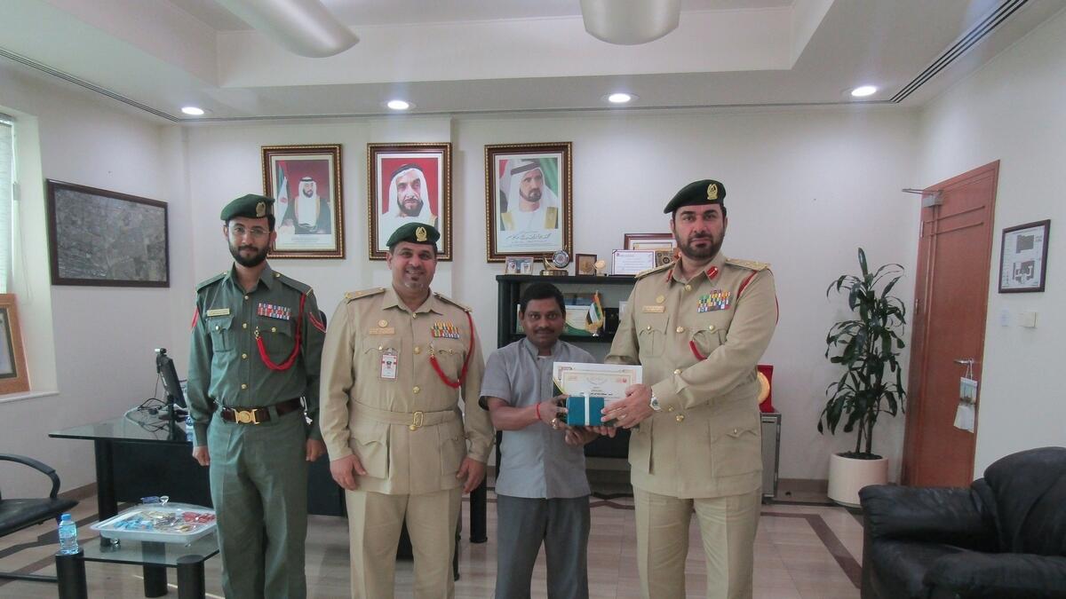 In recognition of his honesty and integrity, the Dubai Police have honoured Motabatolal.- Supplied photo