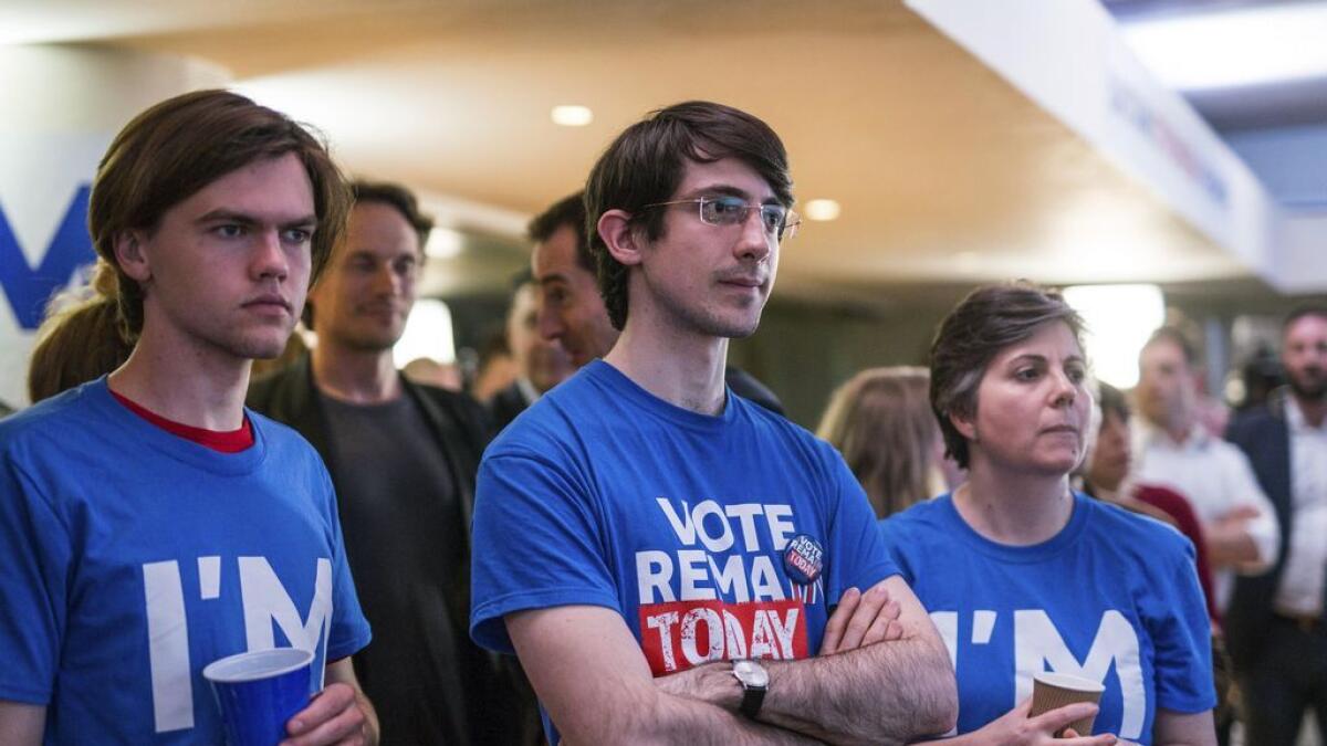 Supporters of the Stronger In campaign react after hearing results in the EU referendum at London's Royal Festival Hall Friday June 24, 2016. On Thursday, Britain voted in a national referendum on whether to stay inside the EU.