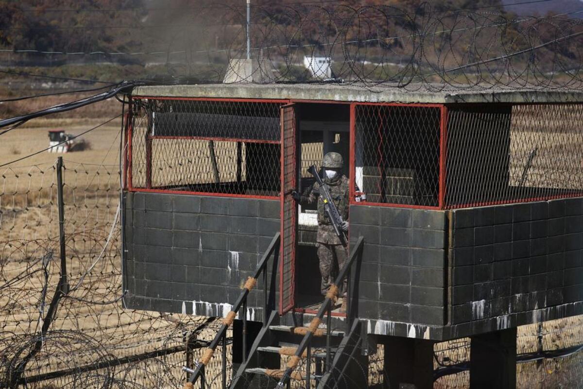 A South Korean soldier stands guard at a guard post near the demilitarised zone separating the two Koreas. Photo: Reuters