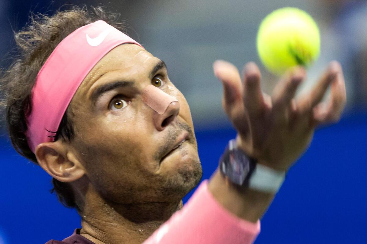 Spain's Rafael Nadal serves to Italy's Fabio Fognini during their US Open second round match. (AFP)