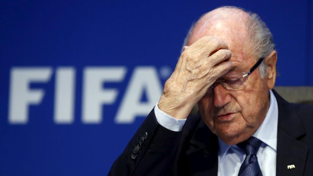 Sepp Blatter gestures during news conference. 