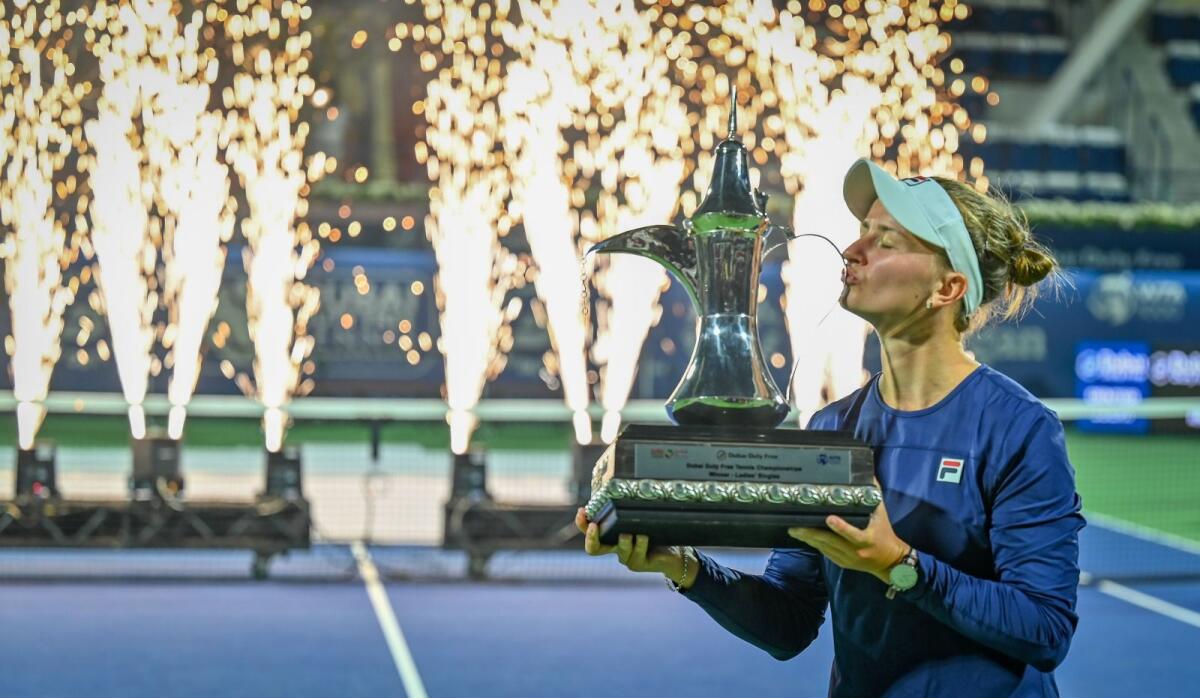 Barbora Krejcikova kisses the trophy after winning the Dubai Duty Free Tennis Championships. — Photos by M Sajjad