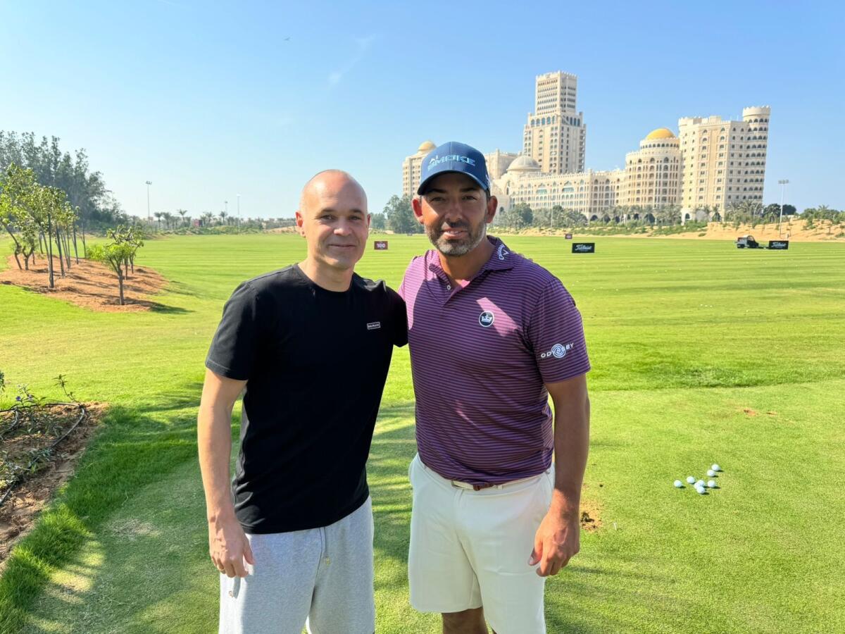 Andres Iniesta with Pablo Larrazabal on the sidelines of the Ras Al Khaimah Championship at Al Hamra Golf Club.- Supplied photo