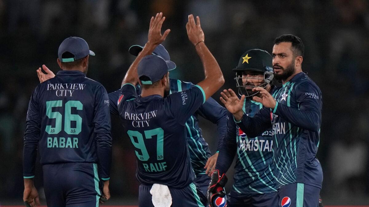 Pakistan's Mohammad Nawaz, right, celebrates with teammates after the dismissal of England's Ben Duckett during the fourth T20 cricket match in Karachi, Pakistan. –AP