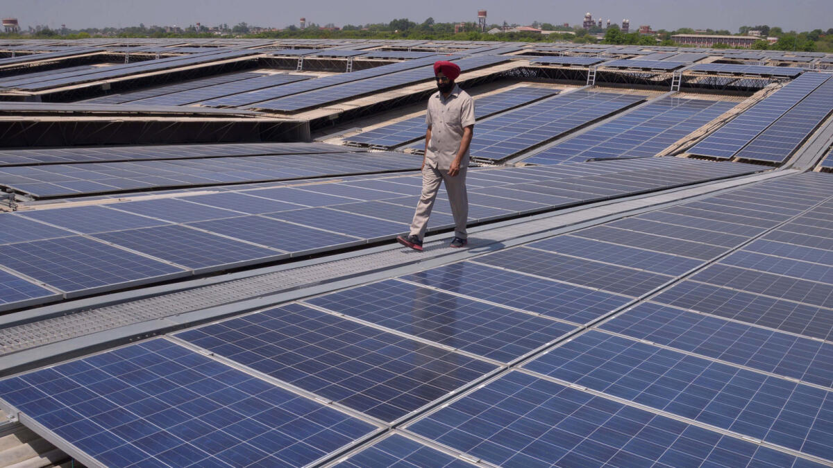 India projects $10 trillion to $15 trillion in investment is needed to achieve net-zero carbon emissions by 2070. — AFP file