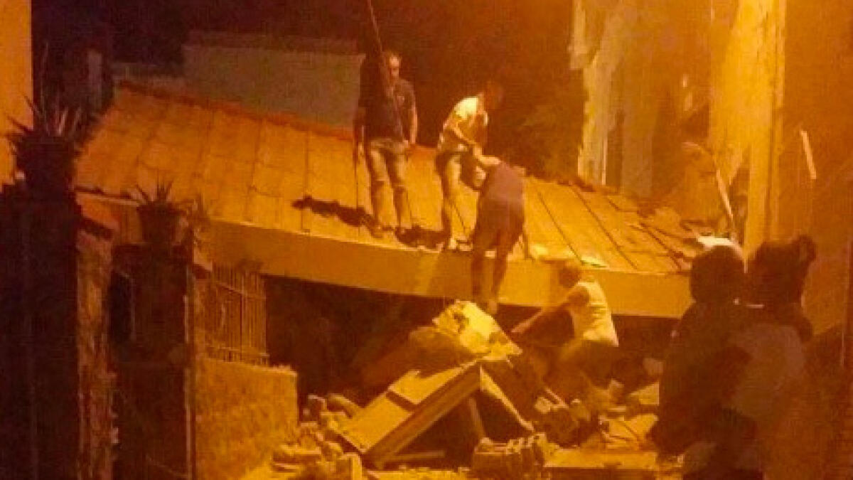 One dead, one missing after quake hits Italy holiday island 
